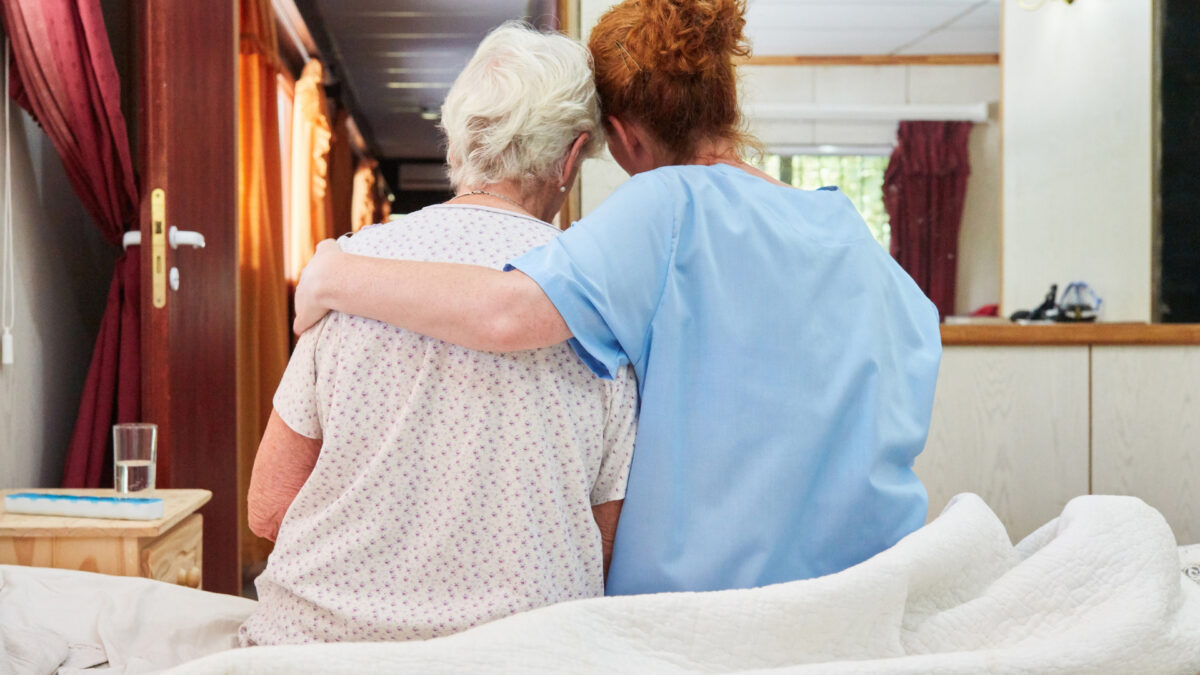 Caregiver supporting a senior