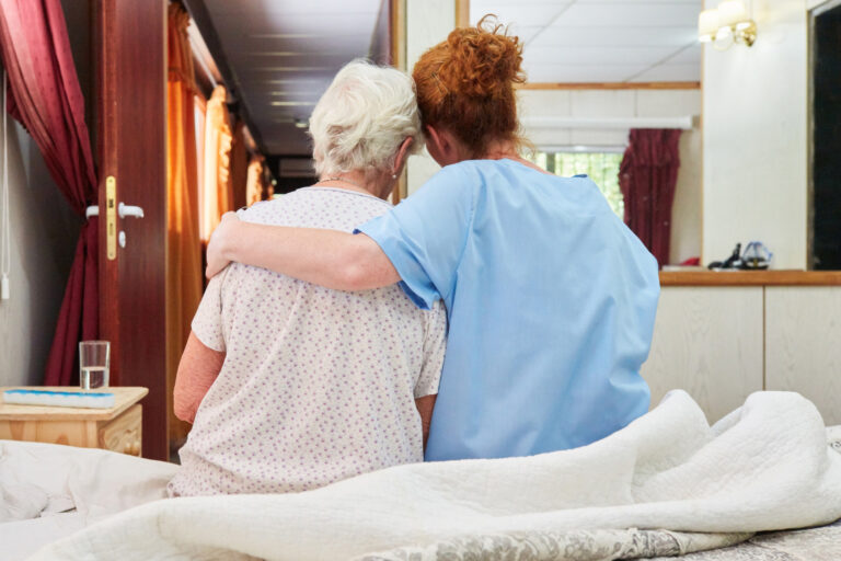 Caregiver supporting a senior